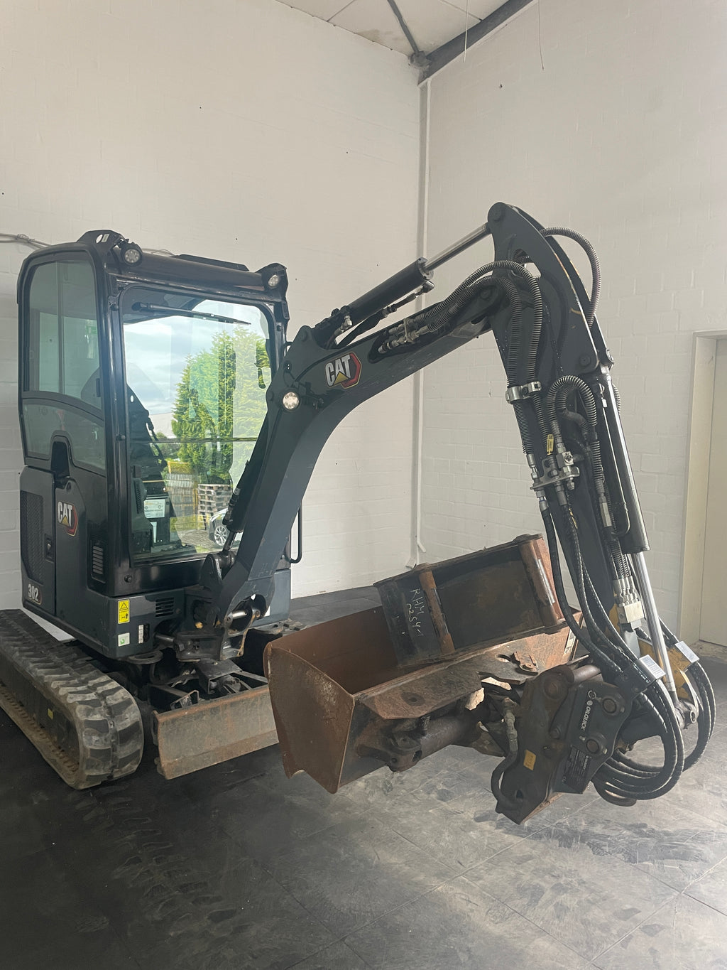 Mini-Ketten-Bagger, CAT 302-05A CR + Tiefenlöffel 755 Std - gebraucht